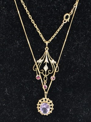 Lot 353 - A 9ct gold amethyst set pendant on fine link...