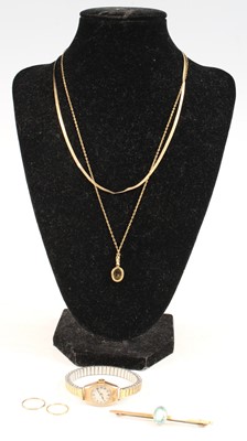 Lot 367 - A 9ct gold blue topaz set bar brooch with...