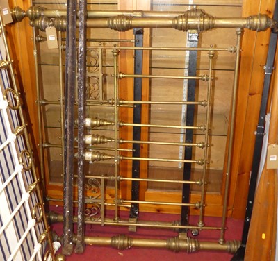 Lot 1225 - A Victorian brass and iron double bedstead,...