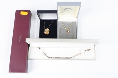 Lot 380 - A modern 9ct gold ruby & cultured pearl set...