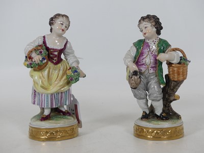 Lot 237 - A pair of Volkstedt porcelain figures, of a...