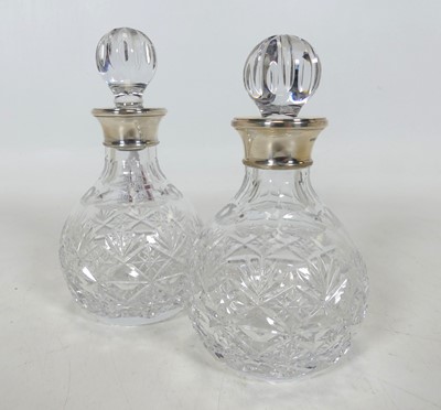 Lot 255 - A pair of cut glass decanters and stoppers, of...