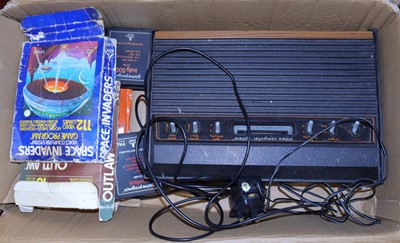 Lot 1522 - An Atari video game console with a quantity of...