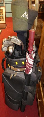 Lot 1088 - A set of Lynx cavity back golf clubs, with bag...