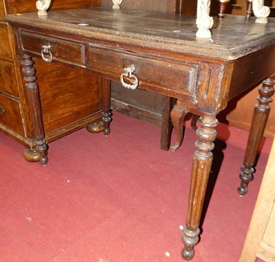 Lot 1239 - An early 20th century oak two-drawer side...