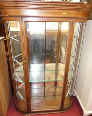 Lot 1243 - An early 20th century walnut single door...