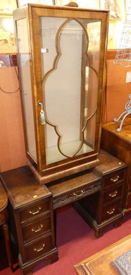 Lot 1254 - An Art Deco walnut single door glazed china...