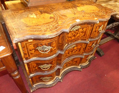 Lot 1300 - A provincial Italian walnut figural and floral...