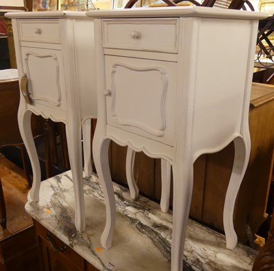 Lot 1306 - A pair of contemporary French style white...