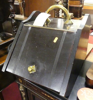 Lot 1312 - A late Victorian stained walnut coal purdonium...