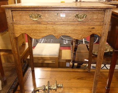 Lot 1323 - An early 19th century provincial joined oak...