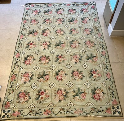 Lot 1466 - A French Aubusson style needlework rug, with...