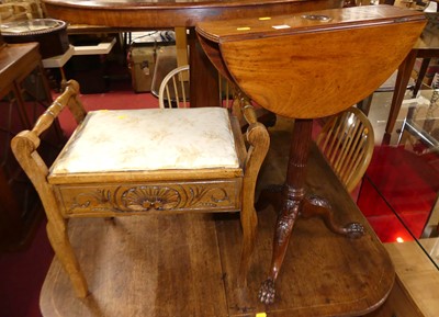 Lot 1348 - A 19th century mahogany drop-flap pedestal...