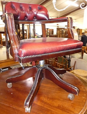 Lot 1349 - A contemporary mahogany ox-blood red leather...