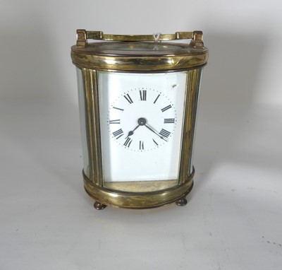 Lot 430 - An early 20th century French lacquered brass...