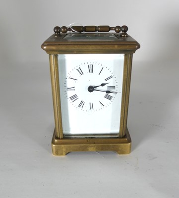 Lot 431 - An early 20th century French lacquered brass...