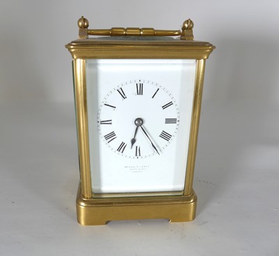 Lot 427 - A late 19th century gilt brass carriage clock,...