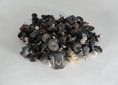 Lot 435 - A collection of teapot finials, 19th century...