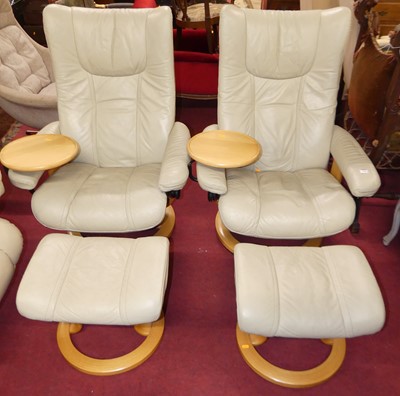 Lot 1364 - A pair of Ekornes Stressless pale leather...