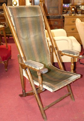 Lot 1368 - An early 20th century walnut folding campaign...