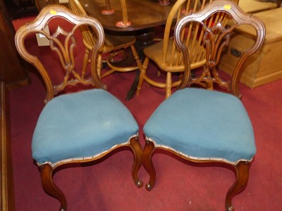 Lot 1372 - A set of five mid 19th century walnut balloon...