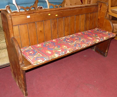 Lot 1374 - A circa 1900 pitch pine mid-sized church pew,...