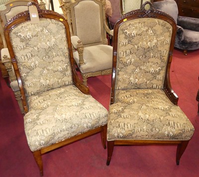 Lot 1388 - A pair of early 20th centuy French walnut...