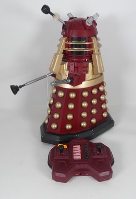 Lot 483 - A remote control Dalek, with maroon and gold...