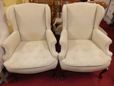 Lot 1397 - A pair of walnut framed and pale fabric...