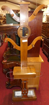 Lot 1398 - A Victorian oak hall tree, with circular inset...
