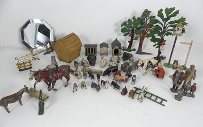 Lot 490 - A collection of painted metal model animals,...