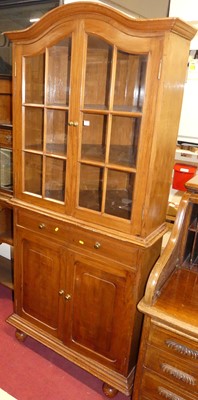 Lot 1419 - A provincial walnut freestanding corner...