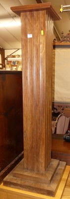 Lot 1433 - An Art Deco figured walnut square pedestal...