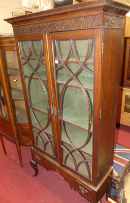 Lot 1458 - An early 20th century mahogany double door...