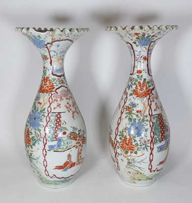Lot 543 - A pair of Japanese porcelain floor vases,...