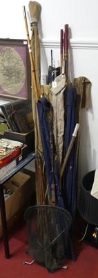 Lot 545 - A collection of fishing rods, to include a...