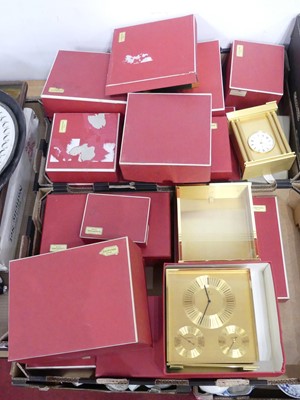 Lot 558 - A collection of Looping brass cased clocks,...