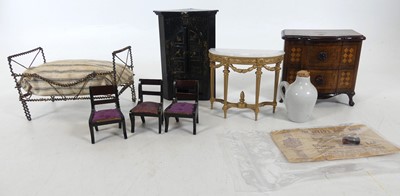 Lot 409 - A small collection of dolls house furniture to...