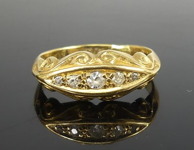 Lot 2507 - An 18ct yellow gold diamond five-stone ring,...