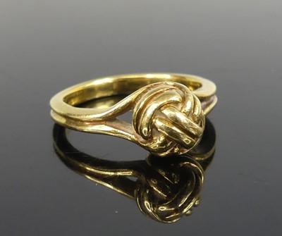 Lot 2520 - An 18ct yellow gold double strand knot style...