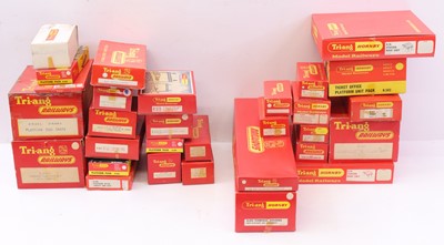 Lot 704 - Two trays of Triang 00 gauge accessories to...