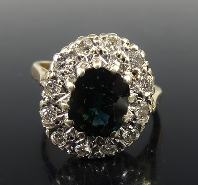Lot 2539 - A 9ct yellow and white gold, sapphire and...