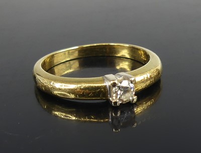Lot 2553 - A yellow and white metal diamond solitaire...