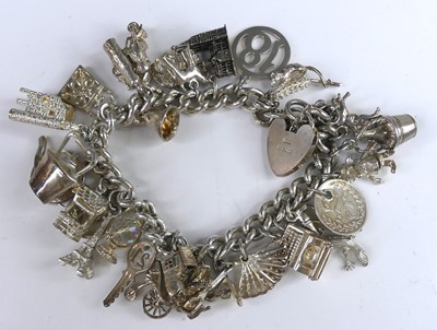 Lot 2573 - A sterling silver heavy curblink bracelet,...
