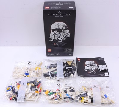 Lot 1545 - A Lego Disney Star Wars No. 75276 helmet...