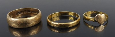 Lot 2586 - Three rings, comprising a 9ct yellow gold...