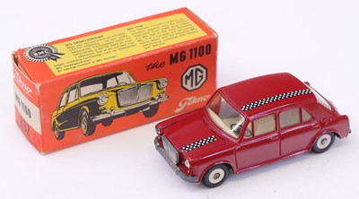 Lot 1411 - Tekno, No.832 MG1100, maroon with white and...