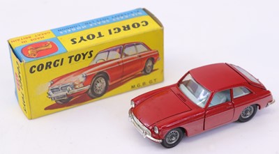 Lot 1239 - Corgi Toys No. 327 MGB GT in red with wire...