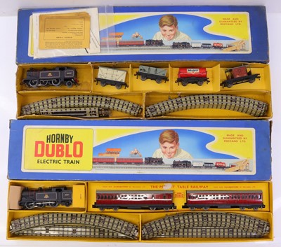 Lot 391 - Two Hornby Dublo 3 rail sets, to include an...