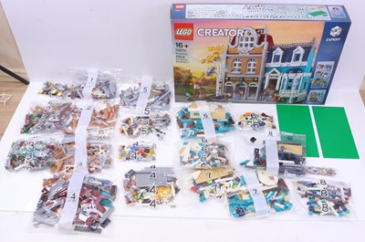 Lot 1573 - Lego Creator No. 10270 Bookshop housed in a...